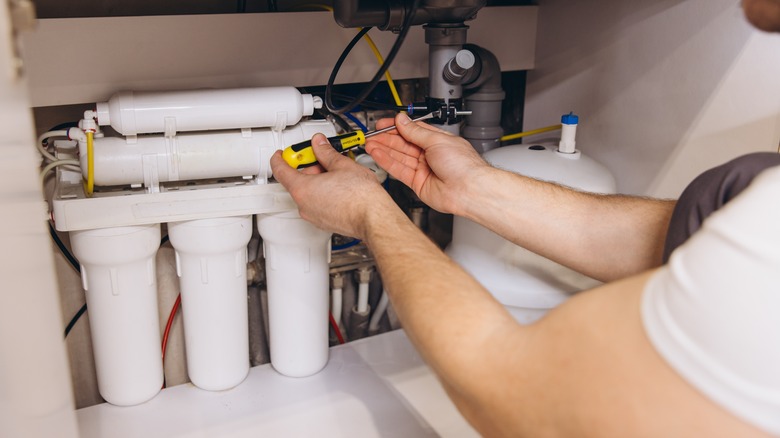 Reverse osmosis water filter under the kitchen sink