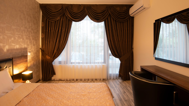 Bedroom with brown valance curtains
