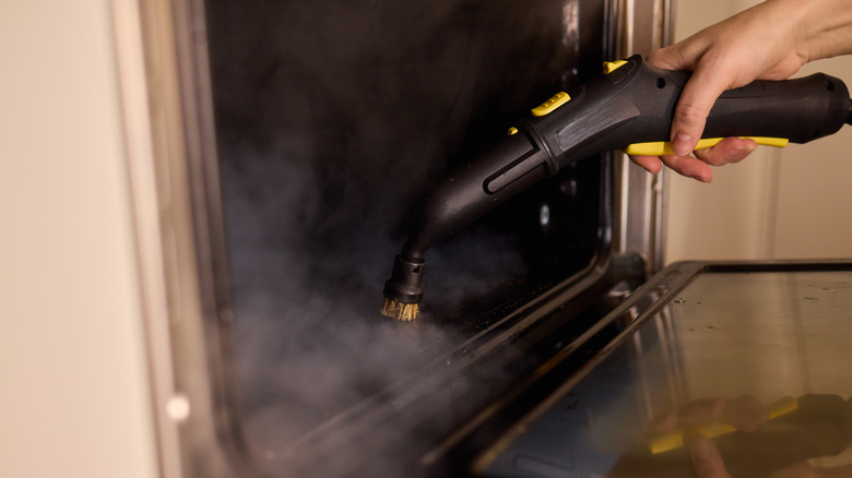 using a steam cleaner brush on the oven