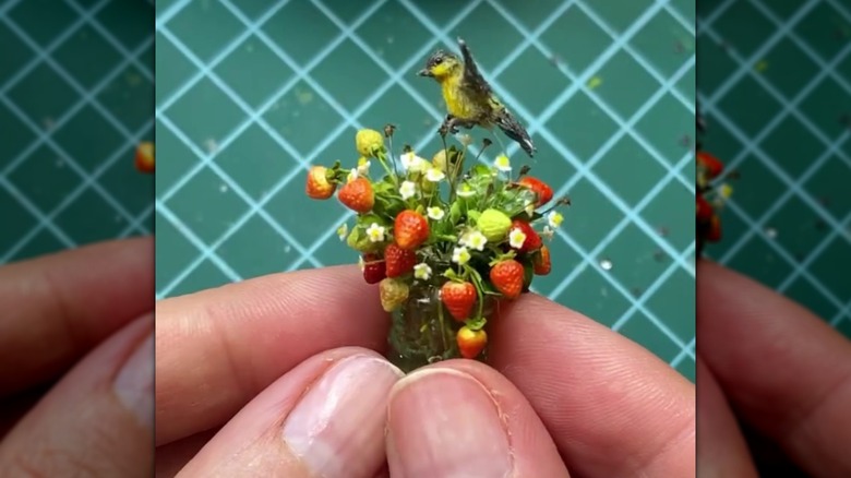 DIY miniature oriole and strawberry bouquet