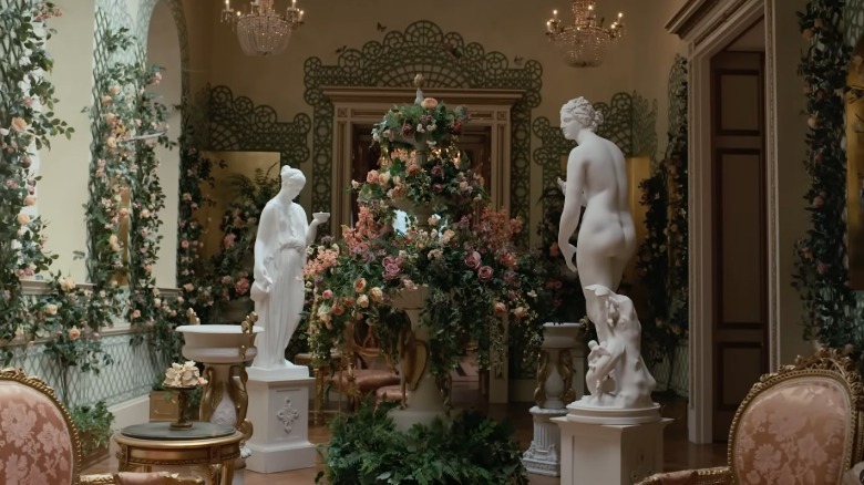 3-tier flower fountain sculpure in the indoor conservatory from the Queen's World set for Bridgerton