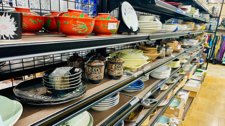 thrift market with lots of porcelain on the shelves