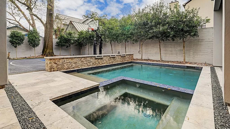 View of pool and basketball court