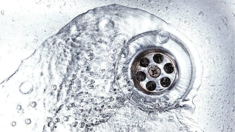 Water swirling around sink drain