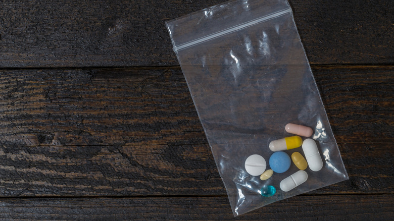 Clear plastic bag with a mixture of medications