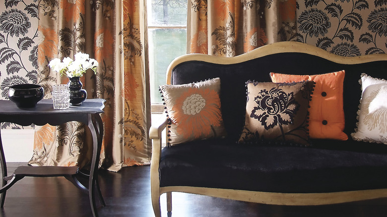 A vintage style interior with bold pattern curtains.