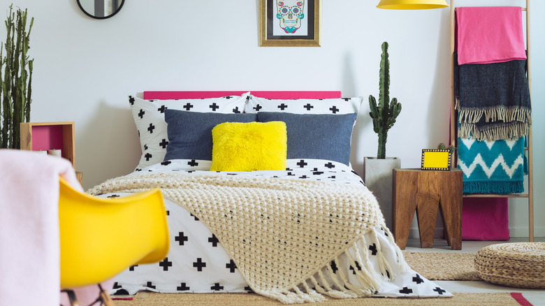 bedroom with loads of prints and colors