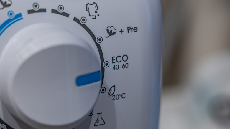 selection of settings on a washing machine dial button