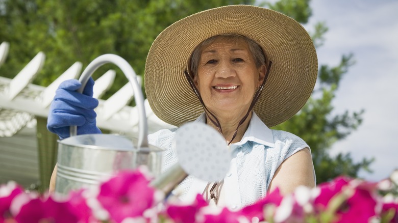 Woman with watering can