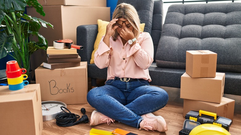 Woman frustrated from packing