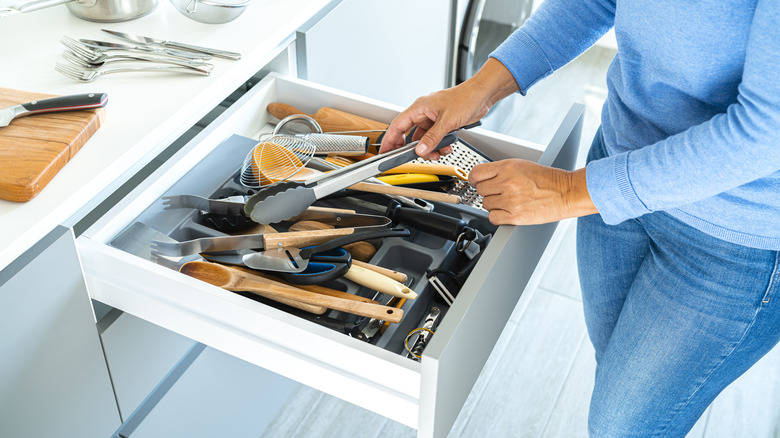 Messy utensils on counter