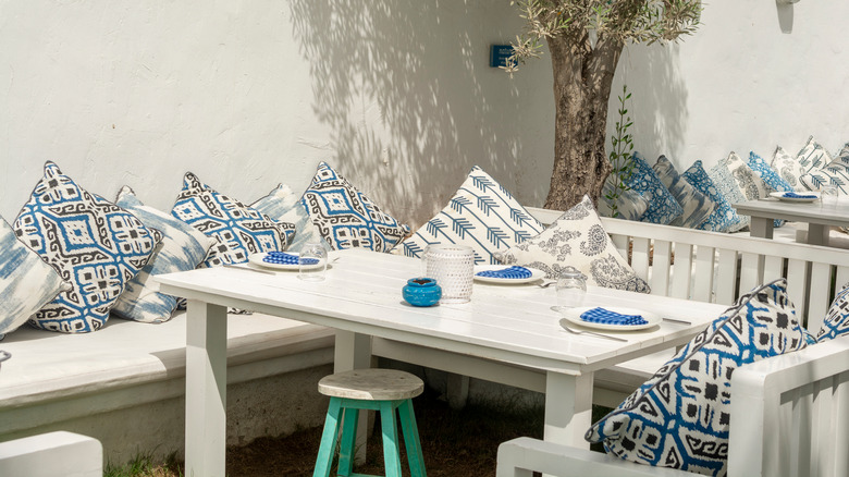 White benches and rectangle table