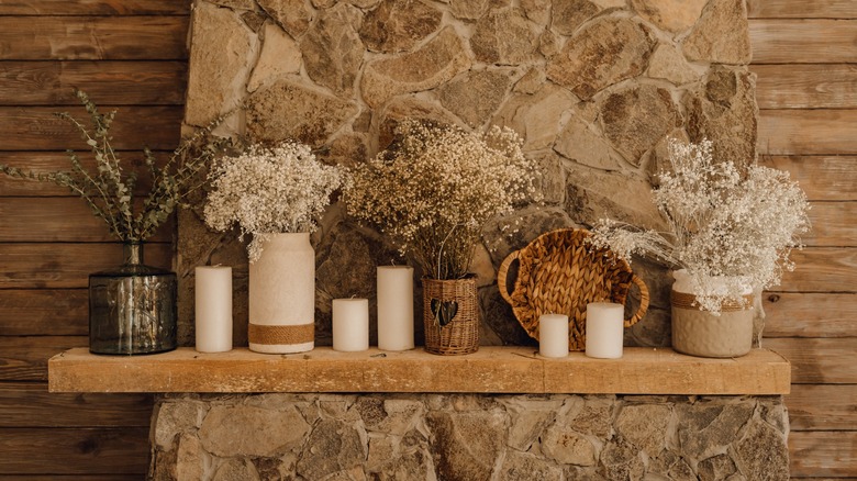 Wooden mantel top with flowers