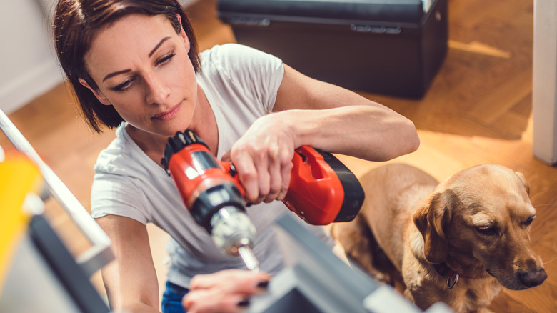 woman using drill