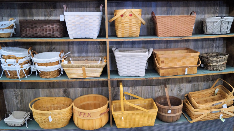 Various woven baskets on display at a store.