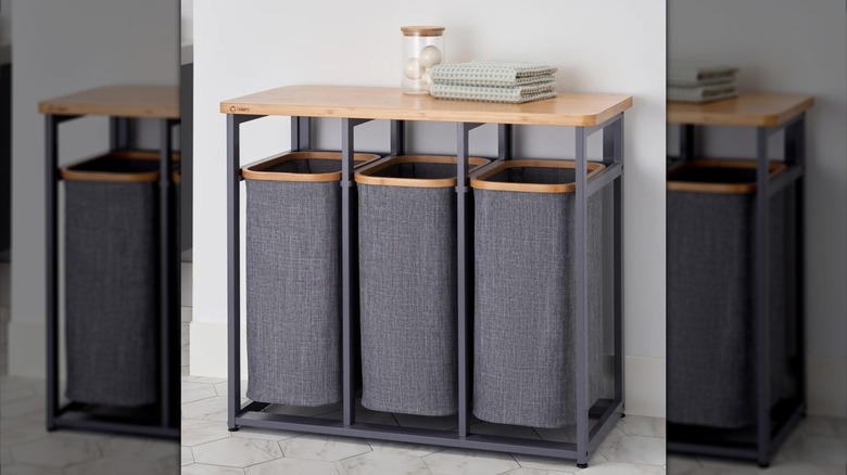Trinity's Bamboo Laundry Station with towels folded on its worktop