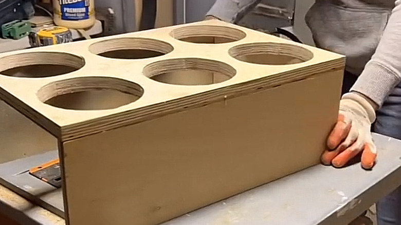 holes for a caddy style organizer for a bathroom drawer