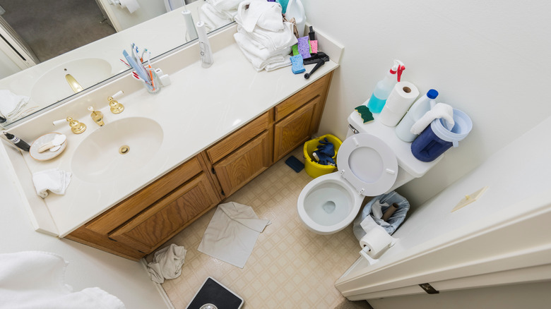 disorganized cramped bathroom