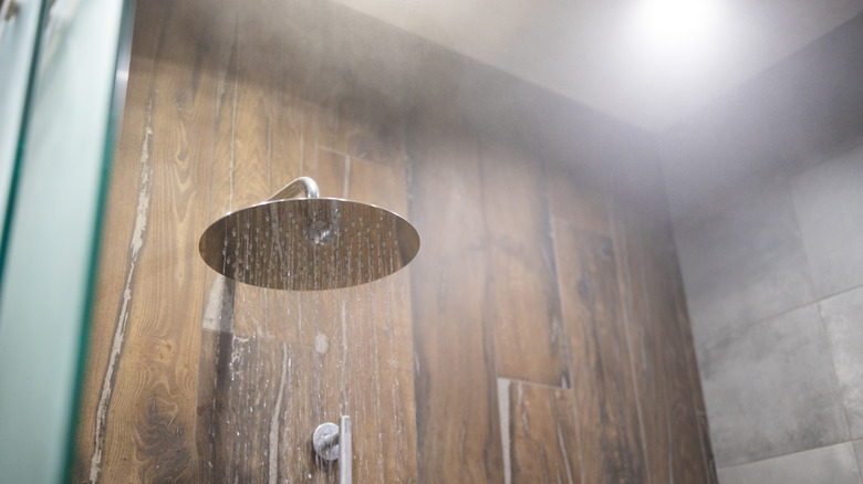 Steam from a running shower in a bathroom