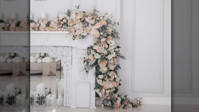Flowers on a fake fireplace