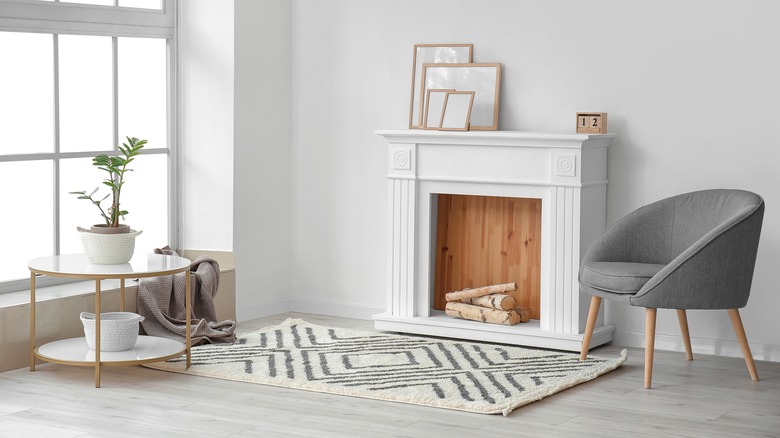Picture frames on a fireplace