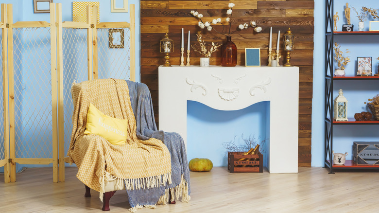 Wood behind a fake fireplace
