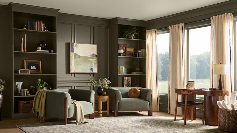 office space with built-in shelves featuring Behr's 2027 color of the year, Grounded