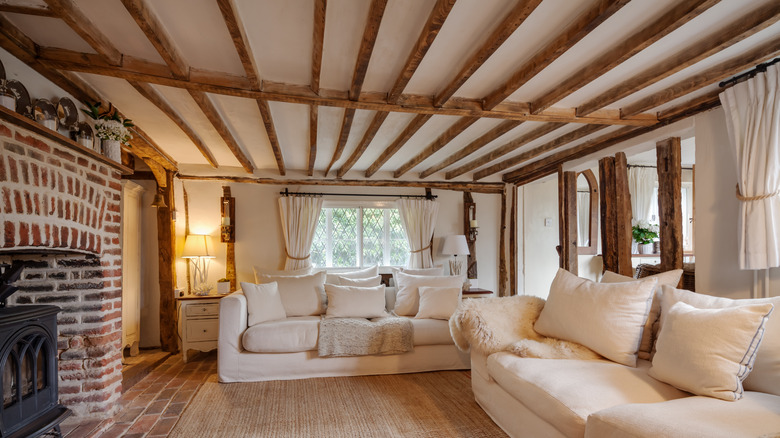 Exposed wood farmhouse living room