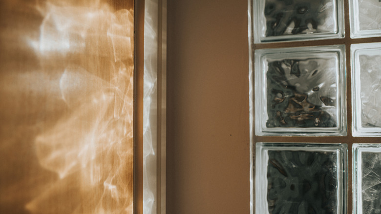 Glass block windows with sunlight filtering through
