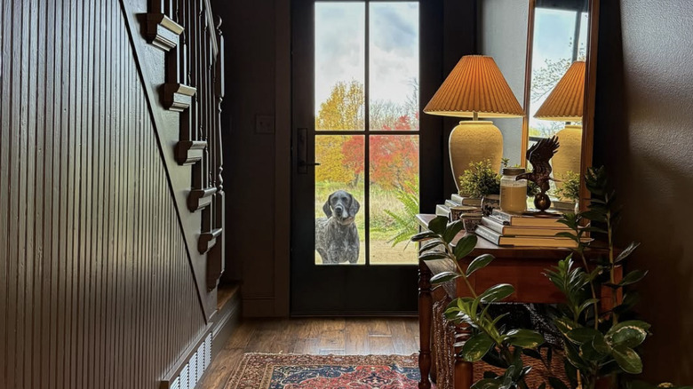 A foyer of a home painted with silhouette by Benjamin Moore