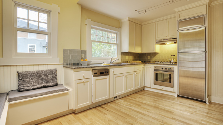 Yellow and beige kitchen interior.