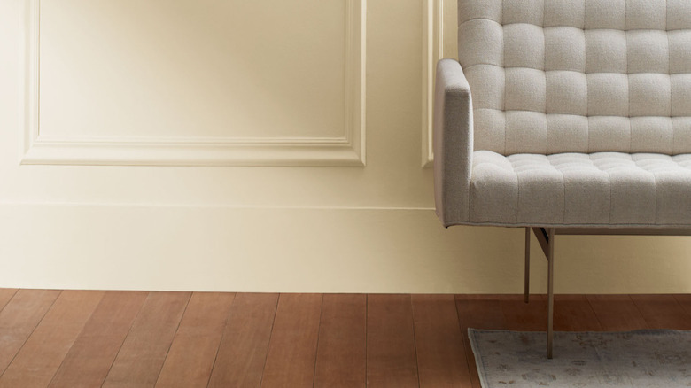 A creamy white interior with wainscoting.