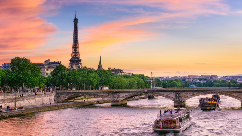 Paris at sunset by Seine River