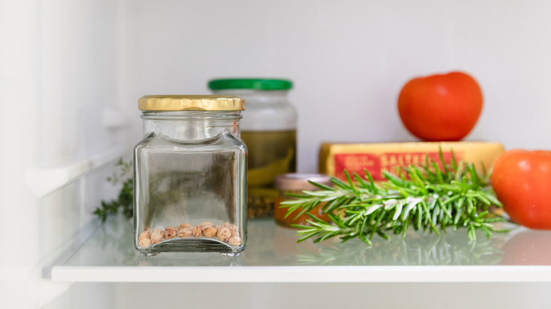 Seeds in a glass jar placed in the refrigerator
