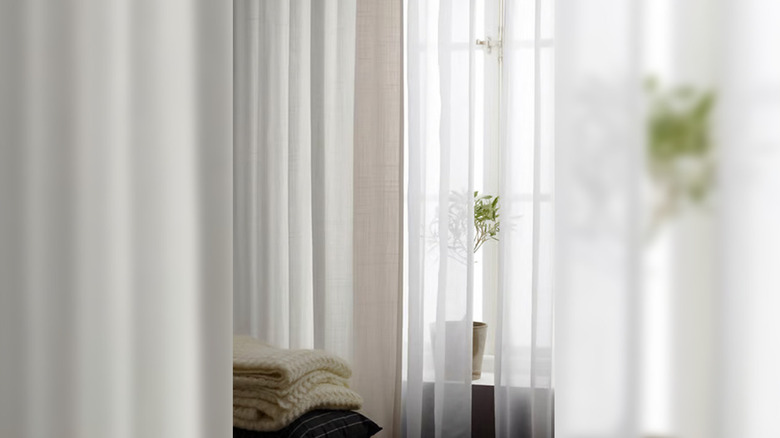 The RITVA Curtains with tie-backs from IKEA in front of a window