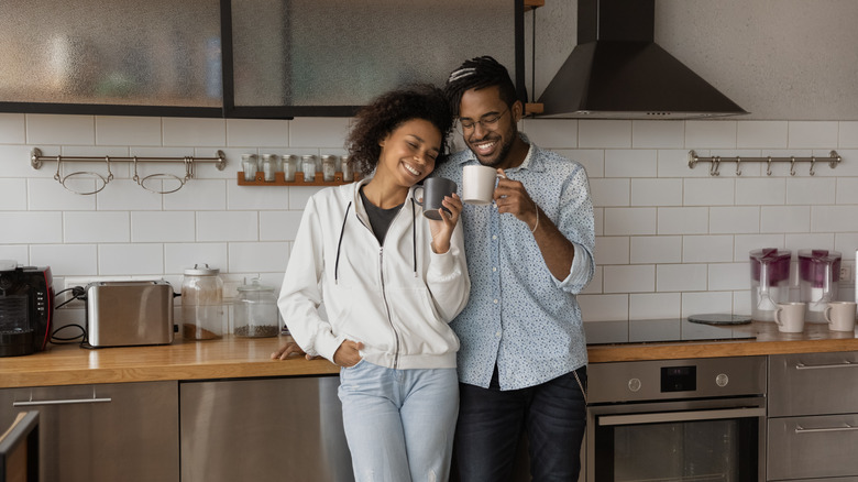 couple in kitchen with coffee
