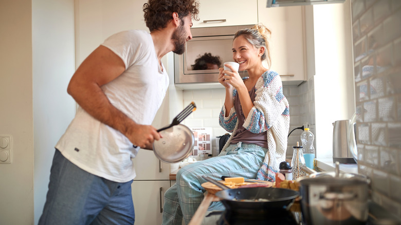 couple having fun in kitchen