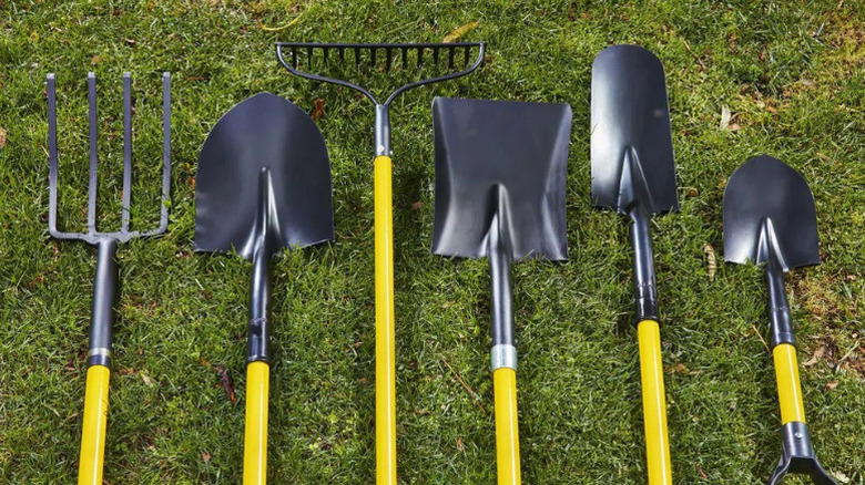 A yellow-handled rake