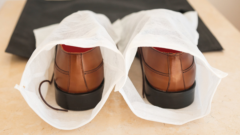 Loafers in dust bags