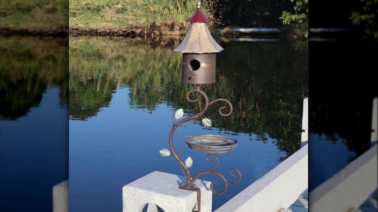 Angel Sar's Deck Metal Bird House on a deck railing