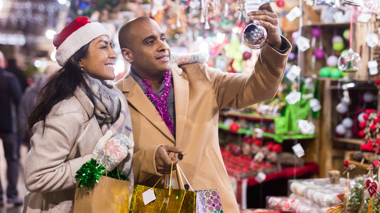 Couple shopping for holiday decor