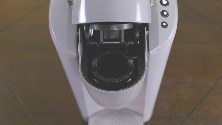 Keurig machine with the K-cup compartment open