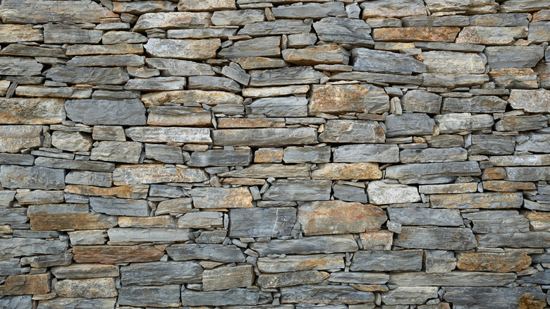 An attractive dry stone retaining wall built from American granite.
