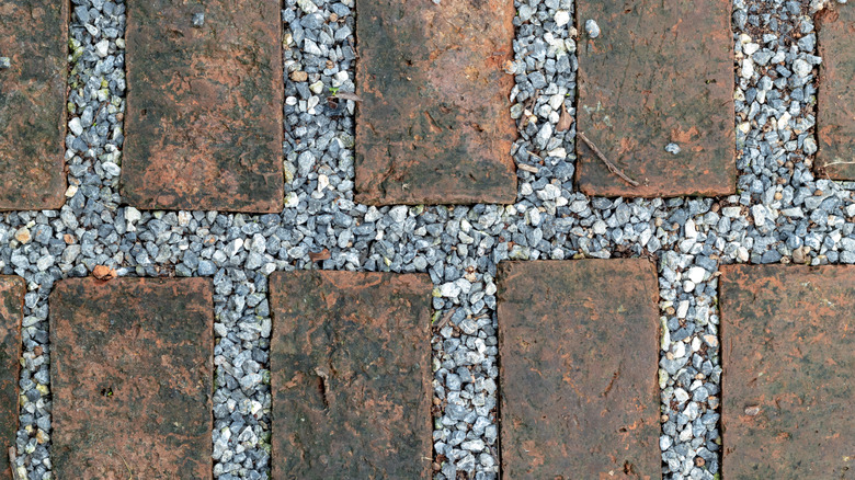closeup of a brick and gravel path