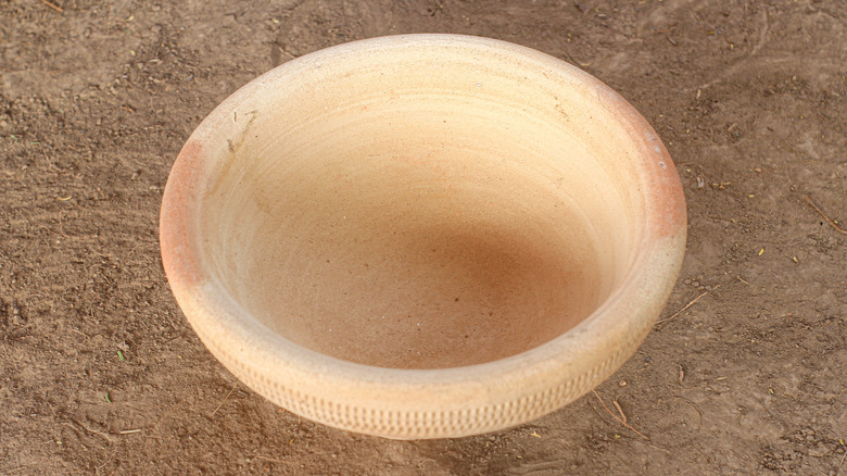 terracotta basin drying on the ground