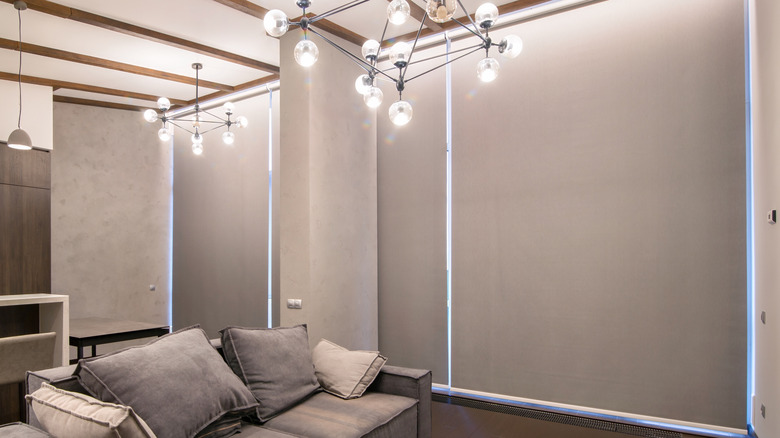 Living room with floor to ceiling blackout blinds