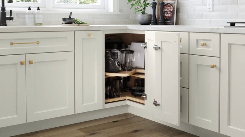 Wooden lazy Susan inside corner kitchen cupboard