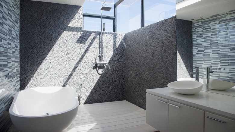 A modern open shower and wet room.