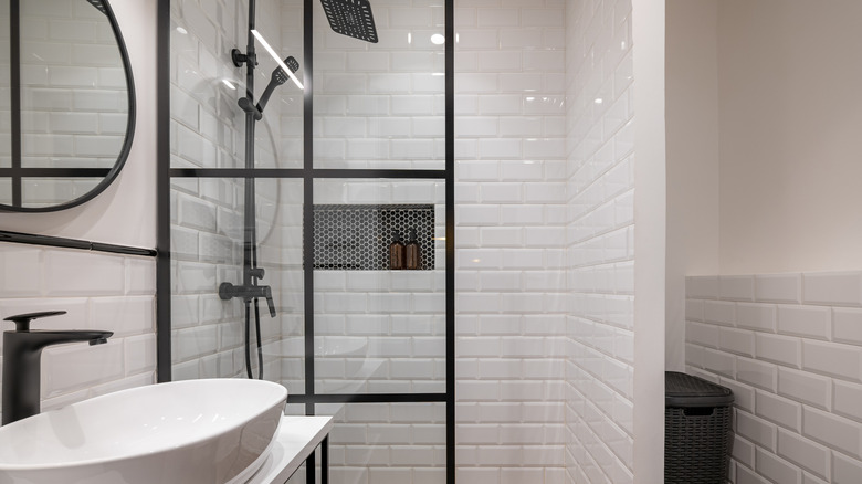 A modern bathroom with matte black fixtures.