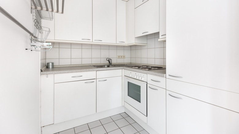 An all-white kitchen looks flat before design changes are made